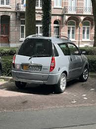 Image result for Gris Acier 2005 Aixam-Mega