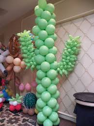 Fill a whole wall with the cactus balloons to make a great photo backdrop for guests. Cactus Balloon Sculpture Cactus Balloon Balloon Flowers Balloons