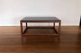 The amish metro coffee table brings a transitional blend of traditional and contemporary, with clean lines and rounded feet. Boss Design Metro Coffee Table American Black Walnut Office Resale