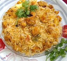 Rice Is Cooked In Stock And Layered With Savory Meat Or Chicken Making This A Easy Biryani Recipe Biryani Recipe Easy Egg Recipes