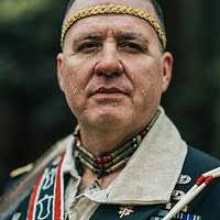 Chief Thomas "Two Feathers" Lewis of the Mehrrin Tribe