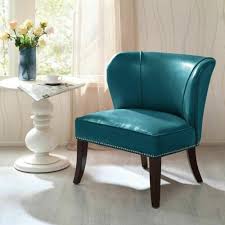 It features bold accent stitching in a quilted waffle pattern that creates texture and visual interest. Buy Luxury Peacock Blue Hilton Faux Leather Armless Accent Chair W Wood Legs Online In Indonesia 223438881530