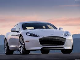 Machined by hand from aluminium, the imposing grille gave rapide s an inimitable front profile. Aston Martin Rapide S 2014 Pictures Information Specs
