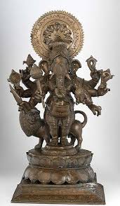 The quadrangular courtyard has two deepmalas. Drishti Ganesha For Entrance To Home My Decorative