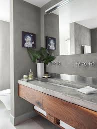 Eine Holzerne Eitelkeit Mit Einer Konkreten Arbeitsplatte Fur Ein Modernes Lakonisches Badezimmer Bathroom Backsplash Bathroom Countertops Concrete Bathroom