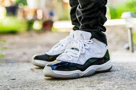 Revered for its luxurious color scheme and premium materials this jordan 11 quickly earned a tuxedo for your feet monicker that only helped increase the lore surrounding one of the greatest sneakers in history. 2011 Air Jordan 11 Concord On Feet Sneaker Review Air Jordan Xi