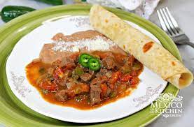 Easy Mexican Beef Stew To Serve With Flour Tortillas Mexican Recipes Recipe Mexican Food Recipes Authentic Mexican Beef Stew Mexican Food Recipes