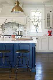 Your backsplash can take your kitchen to the next level, adding instant personality and texture to your favorite space. White Kitchen With Blue Island Farmhouse Kitchen Los Angeles By Showcase Kitchens And Baths Houzz