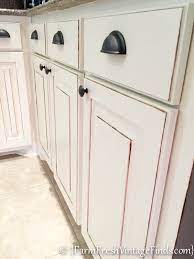 The distressed kitchen cabinets are a great choice for you who want to create the casually chic and welcoming design in your kitchen space. Kitchen Cabinet Refacing On A Budget Farm Fresh Vintage Finds Refacing Kitchen Cabinets Distressed Kitchen Distressed Kitchen Cabinets