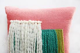 Micro fringe bordeaux indoor/outdoor pillow. Yarn Fringe Pillow Diy A Beautiful Mess