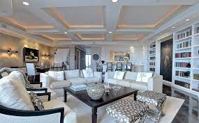 Coffered ceilings take the same approach as a beamed ceiling, but use crown molding to enhance the look. Modern Brass Wall Sconce Wall Sconces Living Room Wall Sconces Brass Wall Sconce