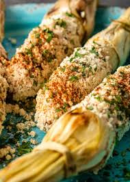 Peel down husks and spread with mayonnaise mixture. Street Corn Recipe Authentic Elote Kevin Is Cooking