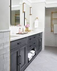 Blue ornate vanity cabinet doors accent a double washstand topped with a white quartz countertop and polished nickel faucets in a transition bathroom finished with a platinum gray feather print wallpaper. Top 70 Best Bathroom Vanity Ideas Unique Vanities And Countertops