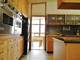 Red is not for the faint of heart, but a bold fire engine red like this one is sure to make a splash in your home. Mid Century Cabinets Kitchen Cabinets