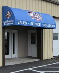 Vinyl Awning With Colorful Logo Applied To Front And Side Edges Waterfall Style Entrance Door Hood Awning Professionally Fabricated Awning Doors Outdoor Signs