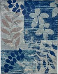 Beautiful color and texture align in this area rug's intricate floral print, illustrated in a subdued palette of green, purple, light blue, and brown atop a cream white base. Tranquil Tra01 Navy Light Blue 8 X 10 Area Rug
