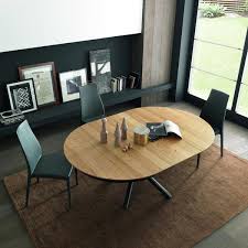 Extending oval table in walnut. Elegant Extending Dining Tables Spaceman