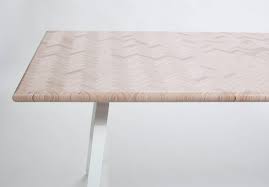 I'll risk stating the obvious: Constructed Surface Table Architonic