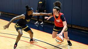 Fever coach Christie Sides: Clark 'makes us all better'