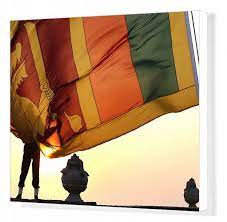 print of an air force officer holds the sri lanka national flag as the sun sets at galle face in 2021 national flag sri lanka sri lankan flag
