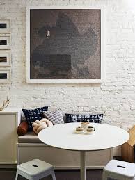 Painting the brick wall with a modest and simple colors like white. Exposed Brick Wall Living Room Design Ideas Designing Idea