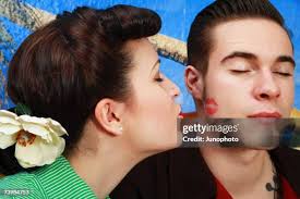 2.534 Guy Kiss Face Stock Photos, High-Res Pictures, and Images