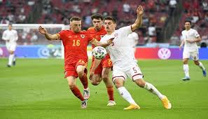 Wales miss out on promotion to the nations league's top tier as they are beaten at home by denmark, who win group b4. Zibps0xs75mjqm