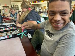 GOOD MORNING, today we had 7 wonderful young people visit us from VPI's  Community Inclusion Program Service, Adults with intellectual and  developmental disabilities. They had fun putting together a beaded  suncatcher. Thanks