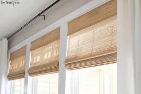 If you're thinking that bamboo only comes in one shade and texture, think again. Budget Friendly Living Room Window Treatments