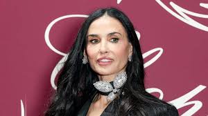 Demi Moore looks mesmerizing in lace-trimmed dress – just wait 'till you see her dramatic hat