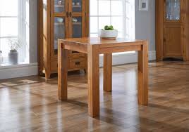 Choose the dining room table design that defines your family's style and character. Country Oak 80cm Square Chunky Corner Leg Dining Table