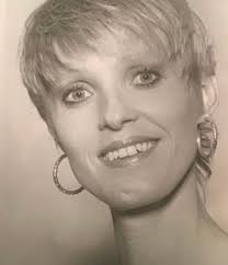 Neal, the bus, and some young ladies. From left: Doris Delay, Black Maria  and Neal Cassady. Photographer unknown.