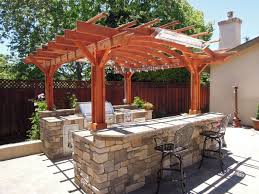 Enjoy Cooking Outside In A New Outdoor Stone Kitchen With Images Outdoor Pergola Wood Pergola Pergola