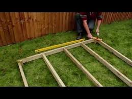 Build the shed walls on top of the timbers and attach to the corner posts. How To Build A Shed Base On A Slope Blog Garden Buildings Direct