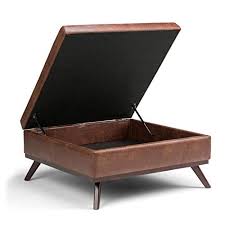Depending on their size, ottomans can be used for seating, as an end table or coffee table, for decoration and storage, to help you kick up your feet—or all of these! Review For Simplihome Owen 36 Inch Wide Square Coffee Table Lift Top Storage Ottoman Cocktail Footrest Stool In Upholstered Distressed Saddle Brown Faux Air Leather Mid Century Modern Living Room