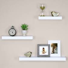 Display charming showpieces, decorative items, and other prized possessions while offering functional storage with square floating design: Floating Shelves Set Of 3 Wayfair