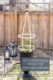 Trellising tomatoes is the best way to save space in the home garden while keeping the fruit clean and healthy. Diy Planter Trellis Perfect For Container Gardens Inspiration For Moms