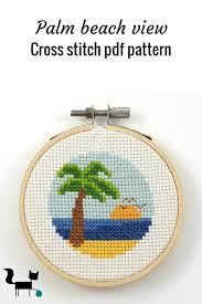 Pattern is black and white symbols. Cross Stitch Palm Tree Novocom Top