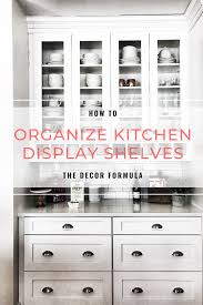 Display cabinet lighting wall mounted display cabinets corner display cabinet buffet cabinet wood display buy beautiful white kitchen dressers, pantries, bookcases and storage cabinets ⩗ in stock ⩗ free uk delivery xylofagou standard display cabinet august grove colour: Display Shelf Organization How To Organize Kitchen Display Cabinets The Decor Formula