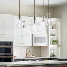For spacing pendant lights over an island, first find the center point of the island. Hang Pendants At Different Heights Design Inspirations Lightsonline Blog