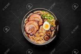 Available in the us for the first time! A Shoyu Ramen In Gray Bowl On Black Slate Table Top Japanese Cuisine Meat Noodle Soup With Chashu Pork Asian Food Stock Photo Picture And Royalty Free Image Image 164307915