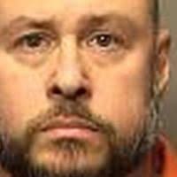 Cops: Councilman jailed