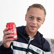 Born the size of a COKE CAN