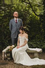 This adorable wedding party complements the bride's lace claire pettibone gown with white bhldn dresses that have a hint of vintage, whether it's lace, chiffon, or a ruched neckline. This Georgia Garden Party Wedding Is A Vintage Lover S Dream Come True Junebug Weddings