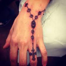 Great male praying hands with rosary beads tattoo on neck. Rosary Bead Tattoo Ideas Designs And Meanings Tatring