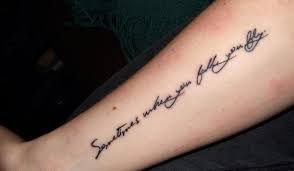 The woman holds out her wrists inked in a cursive font with the message about a forever love from the labyrinth song. Short Quotes For Tattoos 30 Impressive Collections Design Press
