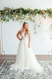 The Wedding Studio In Carmel Indiana At The Clay Terrace Shopping Center Offers A Unique Variety Of Fairy Wedding Dress Wedding Dresses Affordable Bridal Gowns