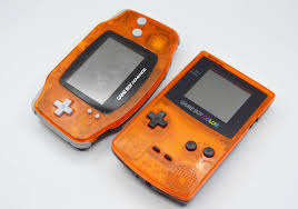Orange And Black Gameboy Color And Gameboy Advance Consoleshoarder Collectinglife Gameboys X Gameboy Gameboy Advance Games