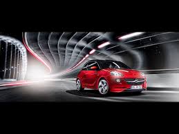 2013 Opel Adam Red Front Motion Wallpapers 2013 Opel Adam Red Front Motion Stock Photos