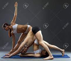 We did not find results for: Yoga Three Flexible People Posing In Difficult Asanas On Gray Background Stock Photo Picture And Royalty Free Image Image 39267656